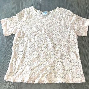 Light pink or cream color shirt, a see threw Shirt